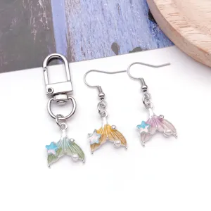 Gradient pearl fish tail alloy ocean pendant and matching diy earrings detail display.