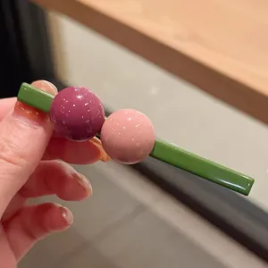 Korean style geometric hair clip with green base and pink purple spheres for sweet girls style
