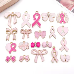 Charmants pendants nœud et ruban émaillés rose pour bijoux DIY vue détaillée ensemble.