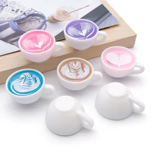 Miniature coffee cup resin charms with cute latte art patterns, perfect for DIY handmade crafts.