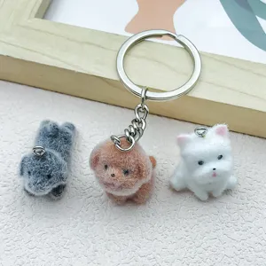 Miniature chiots en résine floquée pendentifs porte-clés gros plan détails accessoires