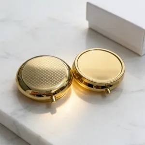 Mini portapillole rotondo in metallo portatile, specchio cosmetico, scatola gioielli oro.