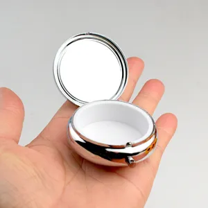 Tragbare Mini Metall Pillendose mit Taschenspiegel und Schmucketui für den täglichen Gebrauch.