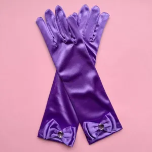 Guantes largos de saten morado para ninas con gran lazo y pedreria detalles de fiesta baile.