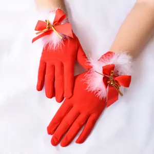 Guanti rossi di Natale da donna con pelliccia sintetica bianca fiocco campanello per feste.
