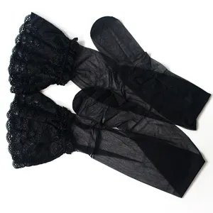 Detailed shot of black sheer thigh high stockings with elegant lace top trim for women.