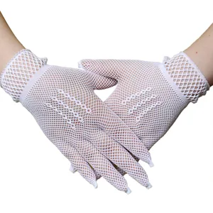 Detailed view of white fishnet mesh short gloves, delicate hollow design for stylish wear.
