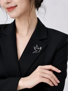 Elegant minimalist silver hollow dove brooch, chic bird lapel pin for suits and daily outfits.