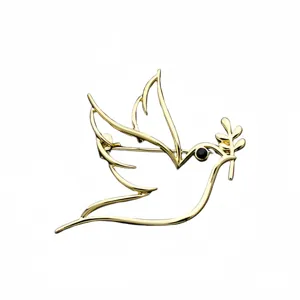 Golden hollow dove brooch for men and women, elegant peace bird lapel pin clothing accessory.