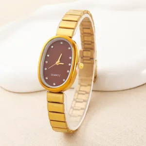 Elegant vintage gold oval quartz watch with brown dial and stylish metal strap for women.