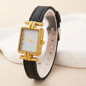 Elegante Damen-Quarzuhr mit quadratischem Goldgehäuse und schwarzem strukturiertem Lederarmband.