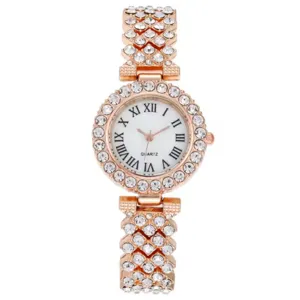 Elegant rose gold rhinestone women quartz watch with white Roman numeral dial and sparkling bracelet