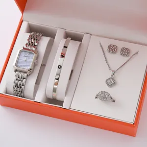 Women's quartz watch and jewelry gift set featuring a square dial steel strap watch and matching accessories.