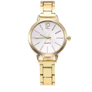 Women's gold quartz watch with metal link strap and white dial, elegant fashion accessory.