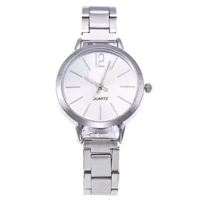 Silver women quartz watch detail view showcasing white dial and metal strap elegance.