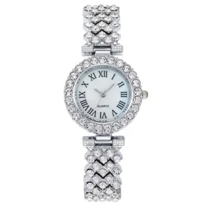 Orologio da donna al quarzo con strass scintillanti, cinturino in metallo argentato numeri romani.