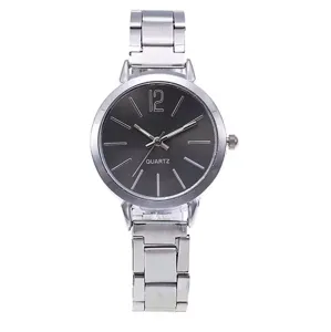 Silver metal quartz watch for women with dark grey dial and minimalist markers for daily wear.