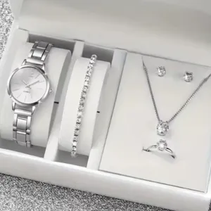 Detailed view of women silver watch and crystal jewelry gift set including bracelet necklace.