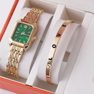Elegante set regalo con orologio al quarzo dorato e bracciale con quadrante verde scuro.