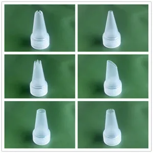 Detailed view of plastic piping nozzle tips in various shapes for DIY craft tools