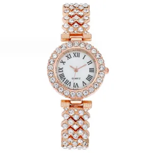 Women rhinestone quartz watch rose gold fashion casual wrist watch with roman numerals.