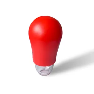 Red silicone egg separator suction tool bulb for kitchen baking and yolk separation.