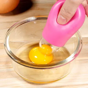 Silicone egg yolk separator detail showing how it easily extracts yolks for baking tasks.