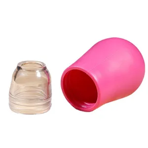 Silicone egg yolk separator kitchen baking tool with squeeze bulb and clear suction nozzle.