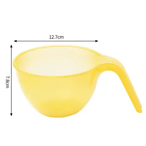 Yellow plastic baking cream mixing bowl detail view showing 12.7cm width and 7.8cm height.