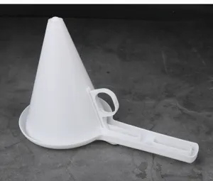 Handheld white plastic cream funnel dispenser and separator for cupcake and baking tools.