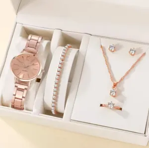 Women rose gold watch set with diamond tennis bracelet necklace earrings ring detail view