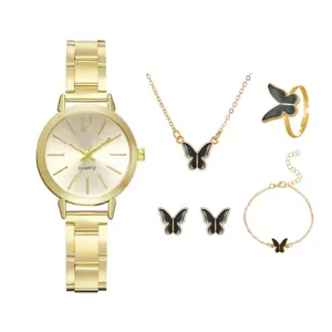 Detailed view of gold quartz watch and black butterfly necklace earrings ring bracelet set.