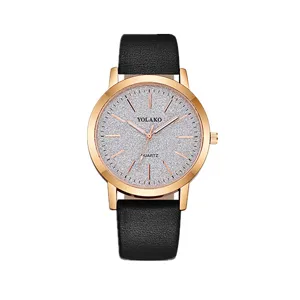 Orologio al quarzo da donna minimalista con cinturino in pelle nera e quadrante glitterato.