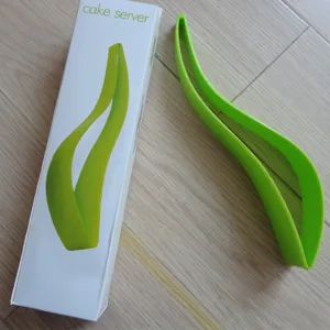 Groene plastic taartschep en taartsnijder mes keuken bakgereedschap met verpakking