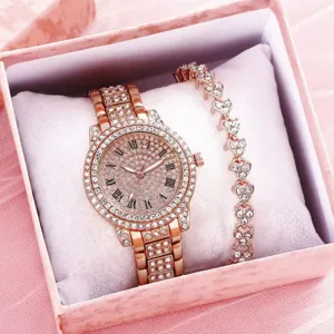 Affascinante orologio al quarzo con strass oro rosa e bracciale cuore in scatola.