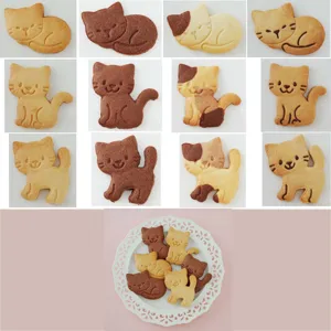 Gedetailleerd overzicht van koekjesvorm kat, met schattige gebakken koekjes en mooie bordopstelling.