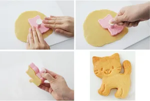Katten koekjesvorm en cartoon pers, gedetailleerd overzicht van bakgereedschap en deeg.