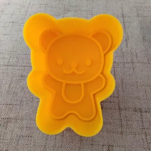 Stampo per panini a forma di orsetto carino e pressa per biscotti dettaglio utensili.