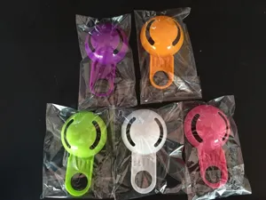 Plastic egg separator set with short handle, bowl edge design for white and yolk filtering.