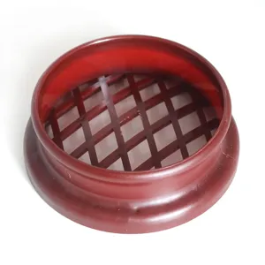 Brown plastic lattice bread mold doughnut cutter baking tool for kitchen pastry making.