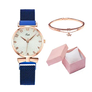 Vista dettagliata orologio donna con cinturino magnetico blu, bracciale e confezione.