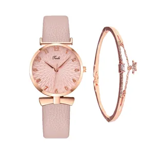 Elegante orologio da donna al quarzo in oro rosa e bracciale in cristallo rosa.