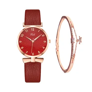 Orologio donna cinturino pelle rosso con bracciale coordinato con stella cristallo.