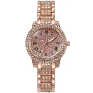 Montre femme strass or rose de luxe avec cristaux étincelants et cadran à chiffres romains.