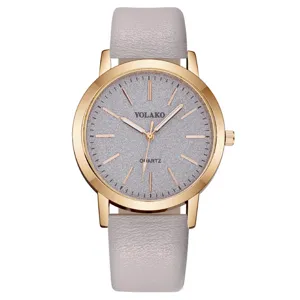 Orologio da donna al quarzo elegante con cinturino in pelle grigia e quadrante brillante.