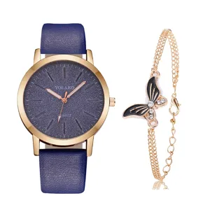 Vista dettagliata orologio donna alquarzo quadrante stellato blu e bracciale con farfalla.