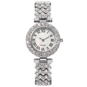 Montre quartz femme strass luxe avec chiffres romains et bracelet chaîne cristal étincelant.