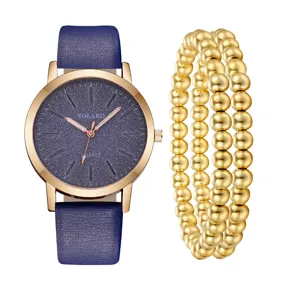 Set orologio da polso donna al quarzo con quadrante blu glitter e bracciali con perline.