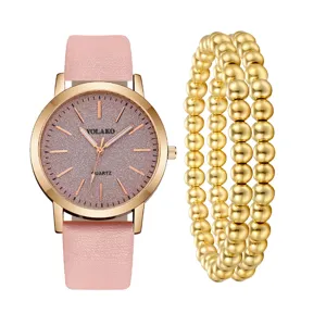 Orologio da polso al quarzo da donna e set di bracciali di perle d'oro cinturino in pelle rosa elegante
