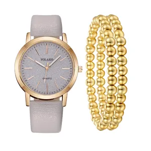 Elegante set di orologio da donna al quarzo con cinturino in pelle grigia e bracciali.